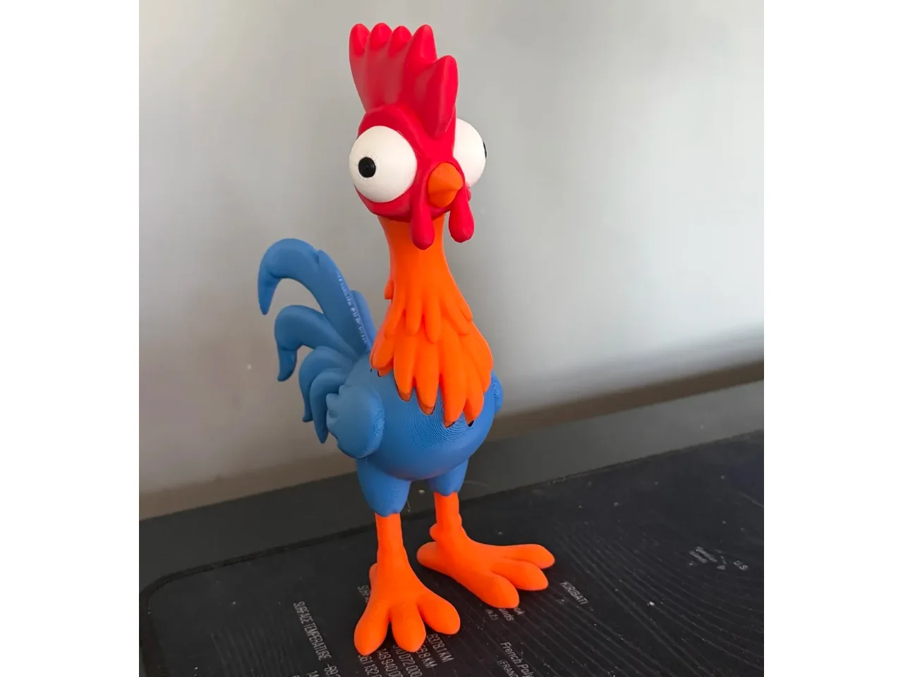 Hei Hei – Estatueta